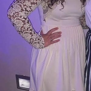 dress with flower print going down the sleeves